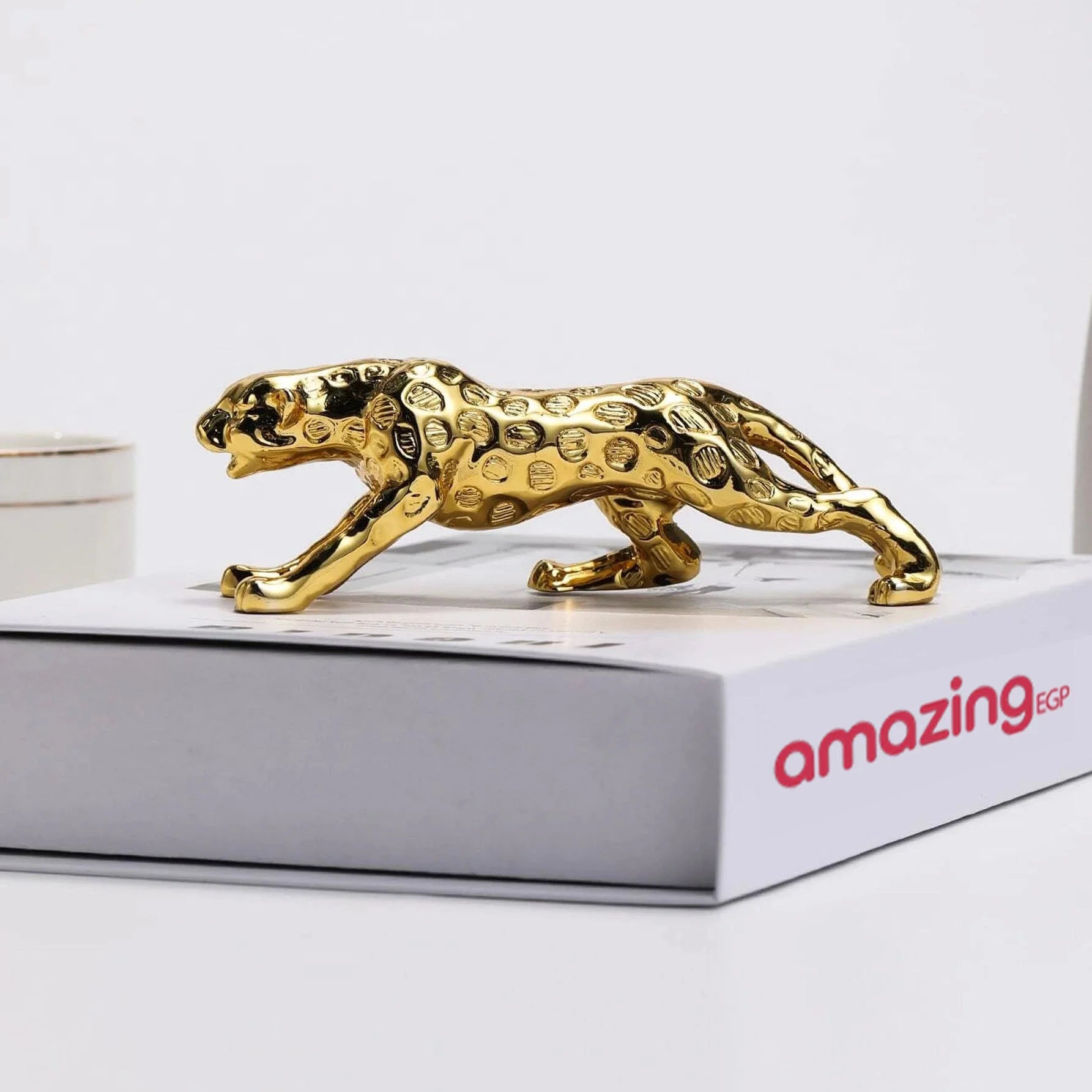 منحوتة مودرن بوليستون ديكور بطباعة جلد الفهد تصميم فهد قطعة واحدة بوليريسين 15 سم 4 سم 45 سم ذهبي | تمثال تمثال مكتب ديكور ديكور_مكتب ديكور_منزل طائر فهد نمر | amazingEGP