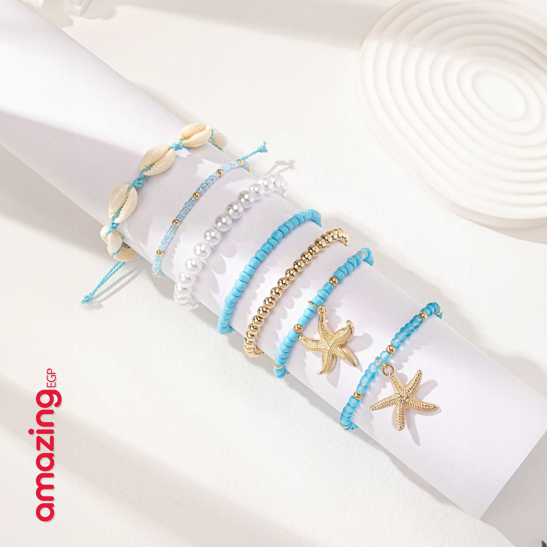 مجموعة أساور نسائية بوهيمية – أصداف ونجمات بتصميم صيفي عصري - (7 قطع)