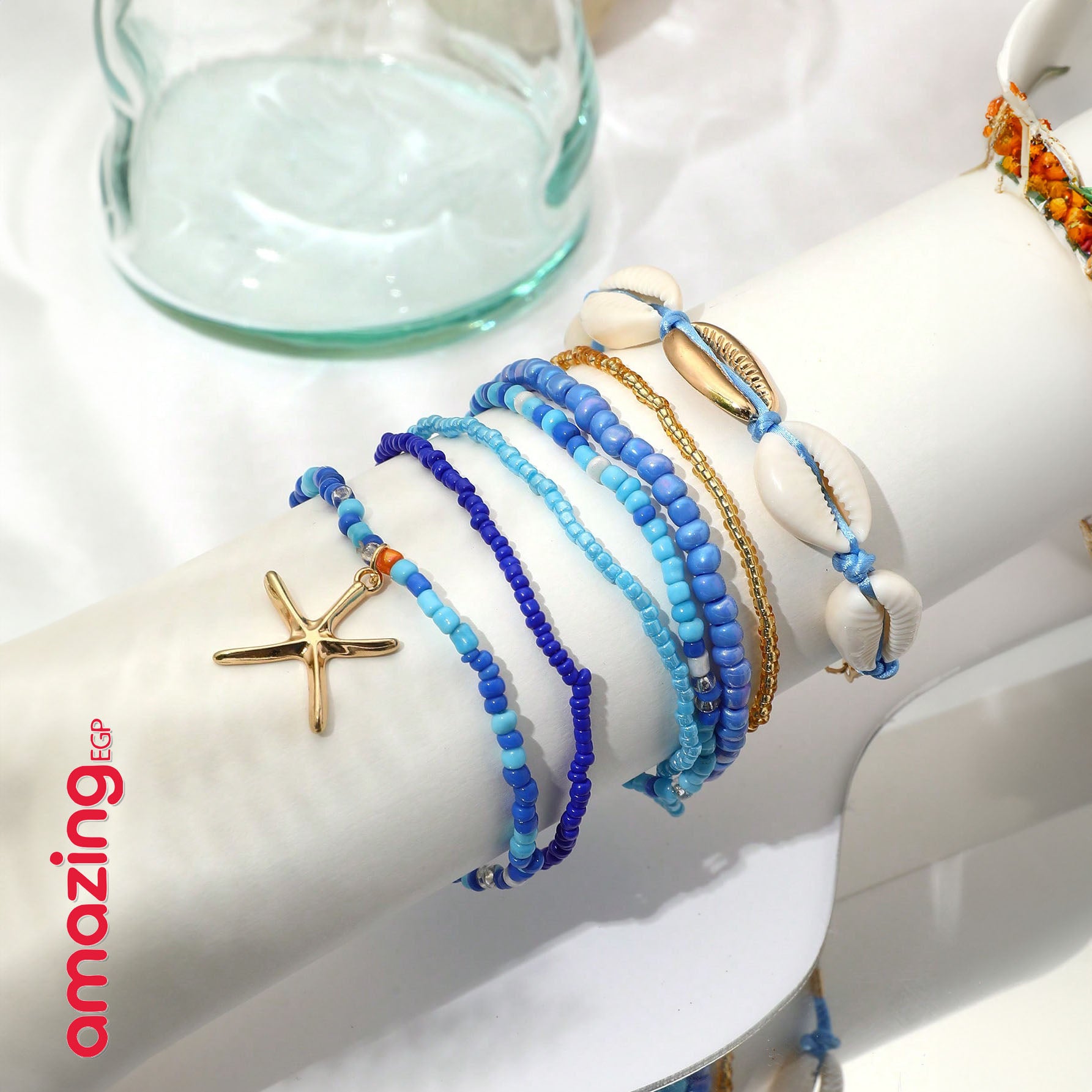 طقم أساور بوهيمي – خرز أزرق مع صدف وتعليقة نجمة بحر، لمسة صيفية جذّابة - 7 قطع - AMZ6111