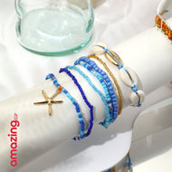 طقم أساور بوهيمي – خرز أزرق مع صدف وتعليقة نجمة بحر، لمسة صيفية جذّابة - 7 قطع - AMZ6111