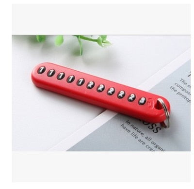 مادلية مفاتيح جلد طبيعي بتعليقة لاضافة رقم تلفون في حالة الضياع